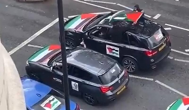 A convoy of vehicles travels through north London in solidarity with Palestinians. Twitter