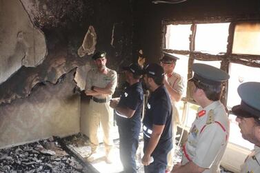 Major General Abdullah Khalifa Al Marri, Commander-in-Chief of Dubai Police, offered condolences to the family of a baby girl killed in a house fire on Sunday. Courtesy Dubai Police