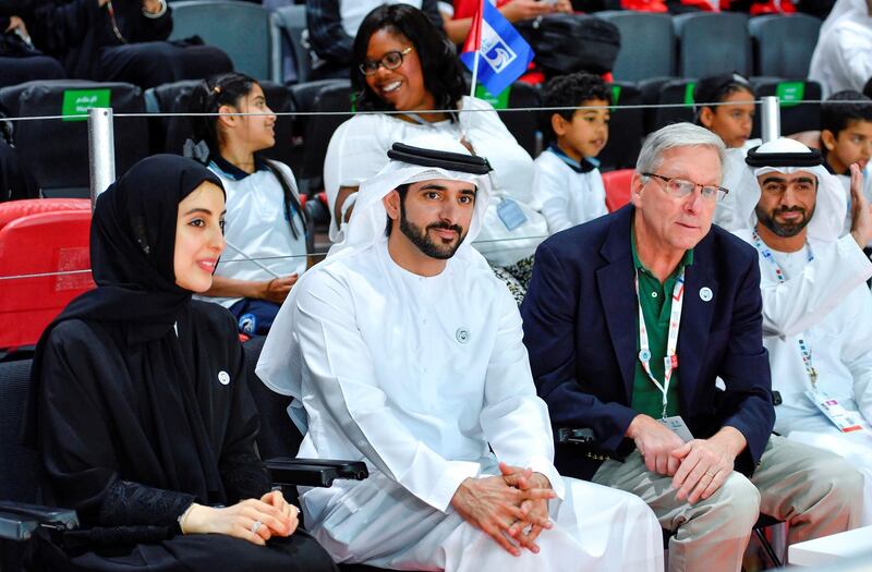 Sheikh Hamdan bin Mohammed, Crown Prince of Dubai, and Shamma Al Mazrui, Minister of State for Youth Affairs, attend the second day of the Special Olympic IX Mena Games in Abu Dhabi on Monday. Wam