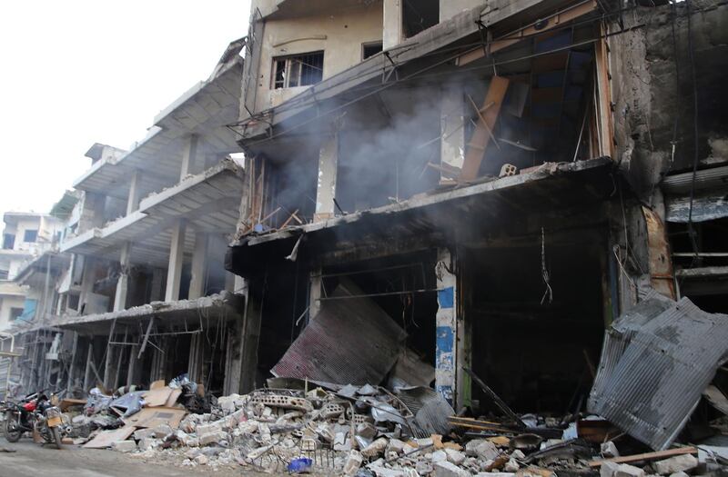 Destruction is seen following a reported Russian air strike in the district of Jisr al-Shughur, in the Idlib province, on September 25, 2017. 
Russian air strikes on northwest Syria's mainly jihadist-controlled province of Idlib killed at least 37 civilians including 12 children, a Britain-based monitor said. / AFP PHOTO / Mohamed al-Bakour