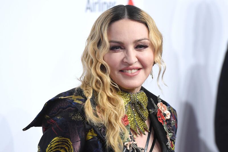 (FILES) In this file photo taken on December 9, 2016 Madonna attends the Billboard Women in Music 2016 event in New York City.
Madonna on April 23, 2018 lost a nearly year-long bid to stop an auction of intimate items including a breakup letter from rap legend Tupac Shakur. A judge ruled that the Material Girl had directed her legal action against the wrong target in going after Darlene Lutz, a New York art dealer and former friend who helped Madonna build a collection before falling out with her.
 / AFP PHOTO / ANGELA WEISS