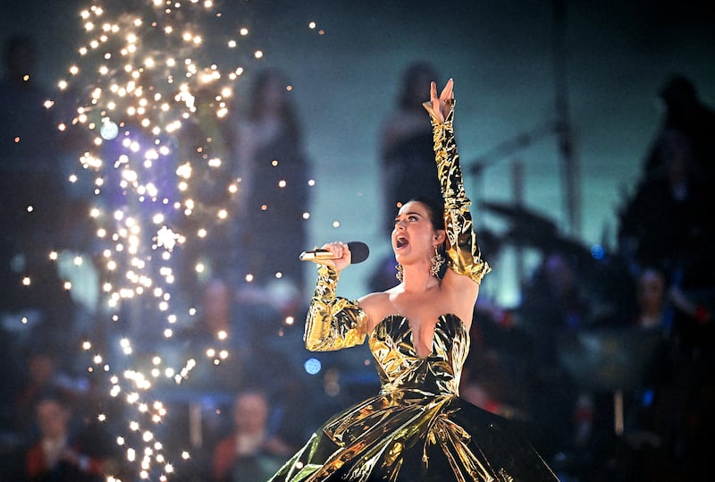 Perry performs 'Firework' before 20,000 people, including King Charles and Queen Camilla. Getty