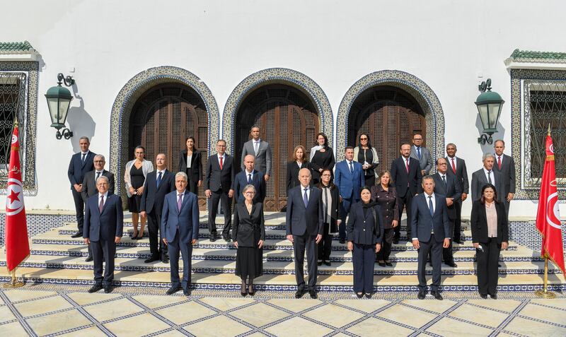 President Kais Saied poses with members of the new government in Tunis. Photo: Tunisian Presidency via Reuters