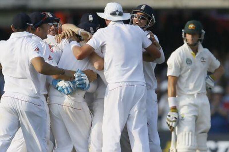 England's players celebrate after beating Australia by a whopping 347-run margin with a day to spare in the second Ashes Test. Kirsty Wigglesworth / AP Photo