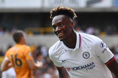 epa07842476 Chelsea's Tammy Abraham celebrates after scoring his teams fourth goal against Wolves during an English Premier League soccer match at Molineux in Wolverhampton, Britain, 14 September 2019. EPA/ANDY RAIN EDITORIAL USE ONLY. No use with unauthorized audio, video, data, fixture lists, club/league logos or 'live' services. Online in-match use limited to 120 images, no video emulation. No use in betting, games or single club/league/player publications