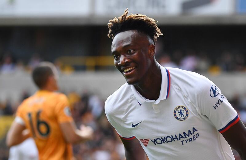 epa07842476 Chelsea's Tammy Abraham celebrates after scoring his teams fourth goal against Wolves during an English Premier League soccer match at Molineux in Wolverhampton,  Britain, 14 September 2019.  EPA/ANDY RAIN EDITORIAL USE ONLY. No use with unauthorized audio, video, data, fixture lists, club/league logos or 'live' services. Online in-match use limited to 120 images, no video emulation. No use in betting, games or single club/league/player publications
