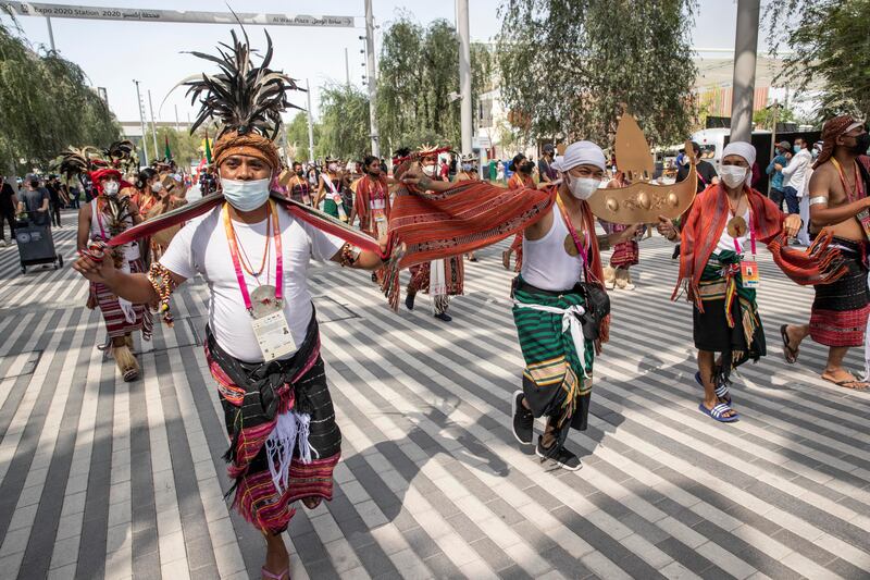 Performers from the Timor-Leste pavilion taking part in the daily parade at Expo 2020 Dubai. All photos by Antonie Robertson / The National