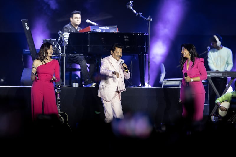 From left: Shweta Mohan, Udit Narayan and Jonita Gandhi on stage.