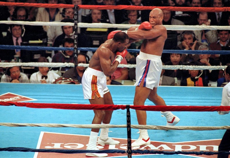 19 Apr 1991:  Evander Holyfield lands a left punch during a fight against George Foreman in Atlantic City, New Jersey. Mandatory Credit: Rick Stewart  /Allsport
