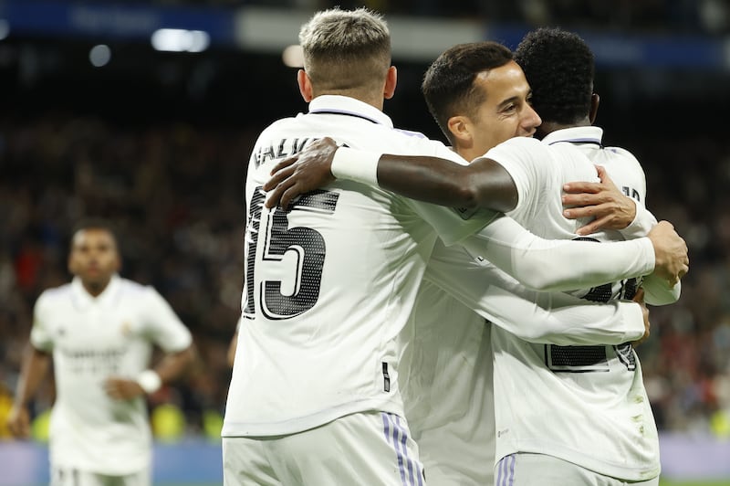 Lucas Vazquez celebrates with Real Madrid teammates after scoring against Sevilla. EPA