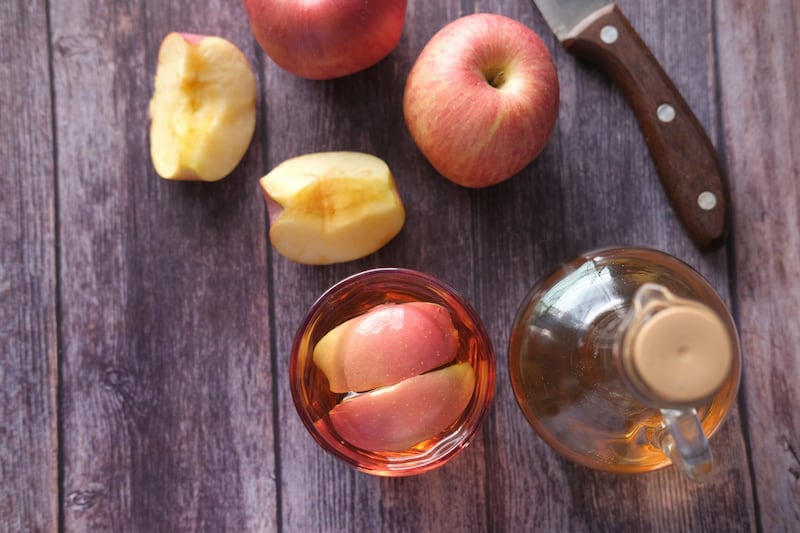 Apple cider vinegar is made of fermented apple juice and has been linked to weight loss. Photo: Towfiqu Barbhuiya / Unsplash