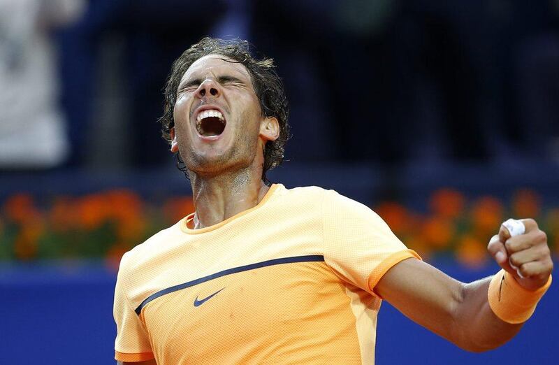 Rafael Nadal celebrates after winning the Barcelona Open, the ninth time he has won the tournament. Manu Fernandez / AP Photo 