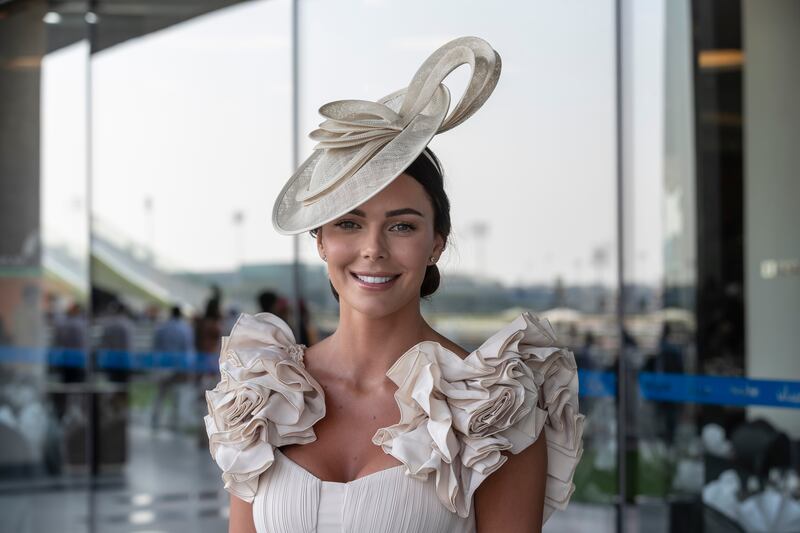 A racegoer matches her hat with her outfit for the Dubai World Cup 2023, held at Meydan Racecourse. All photos: Antonie Robertson / The National