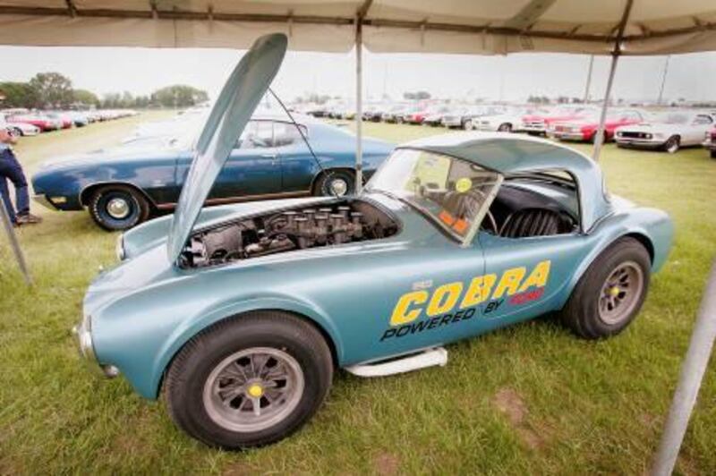 BELVIDERE, IL - MAY 27:  A 1962 Shelby Cobra sits under a tent after selling for $1.5 million at the Mecum collector car auction May 27, 2006 in Belvidere, Illinois. The auction specializes in 'Muscle Cars' which are primarily defined as high performance two-door sedans and convertibles built between 1964 and 1971. Values of these cars have soared in recent years as baby boomers who remember these cars when they were young reach their peak earning years and view these vehicles as functional investments.  (Photo by Scott Olson/Getty Images)