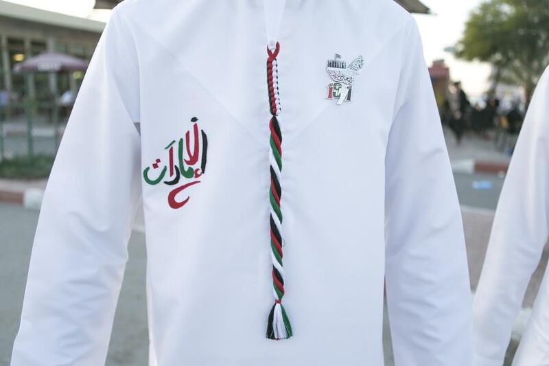 A young Emirati is creative with his custom-made kandura in RAK. Reem Mohammed / The National
