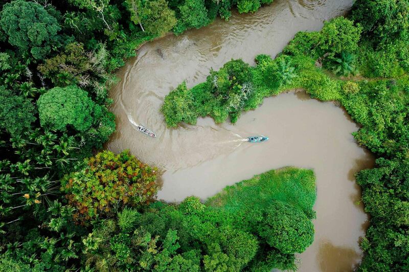 Indonesian forest rangers on boats patrolling the Leuser ecosystem near Suaq Balimbing, Aceh. AFP