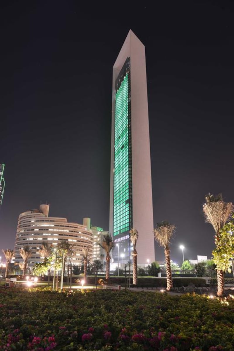 ADNOCs new building is illuminated with green lights to coincide with Abu Dhabi Sustainability Week. Courtesy General Secretariat of the Executive Council