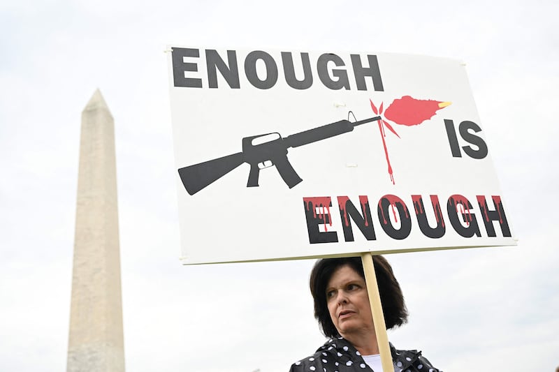 Gun control advocates participate in the March for Our Lives in June 2022 as they protest against gun violence during a rally near the Washington Monument in Washington, DC. AFP