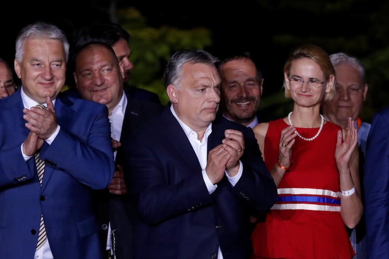 Hungarian Prime Minister Viktor Orban applauds following the preliminary results in Budapest, Hungary. Reuters