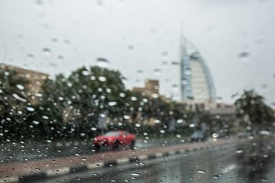Dubai, U.A.E., March 22, 2017.   Dubai Rains for Liz.  Rainy morning on Jumeirah Beach Road, Burj Al Arab area.
Victor Besa for The National
ID: 
Reporter:   
National *** Local Caption ***  on22mr-weather-24.jpg