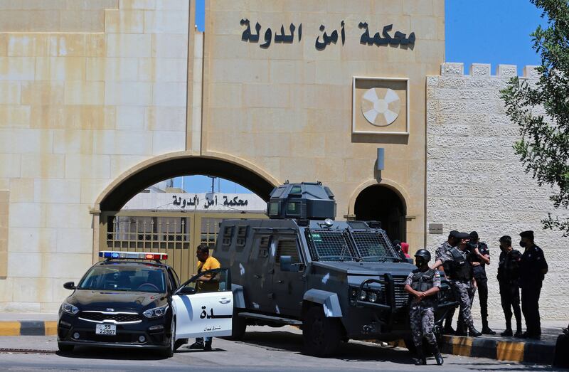 Officers stand guard outside Jordan's State Security Court. AP