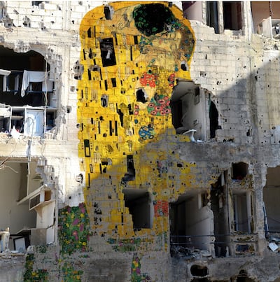 Tammam Azzam duplicated Gustav Klimt's The Kiss painting on the side of war-ruined building in Syria. The work is titled: Freedom Graffiti. For a blog by Anna Seaman, Aug. 2015
CREDIT: Courtesy Ayyam Gallery  *** Local Caption ***  al77au-Blog-Dismaland-2..jpg