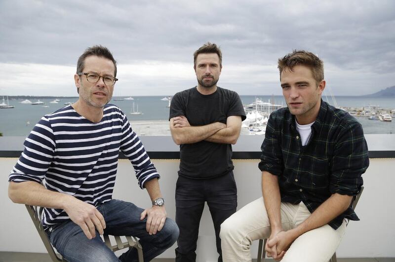 From left, actor Guy Pearce, director David Michod and actor Robert Pattinson at the 67th Cannes international film festival. Thibault Camus / AP Photo