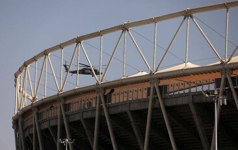 A US military helicopter flies over the Sardar Patel Gujarat stadium on February 22, 2020. Reuters
