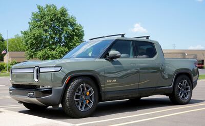 A Rivian R1T electric truck outside Munro & Associates headquarters in Auburn Hills, Michigan. Reuters