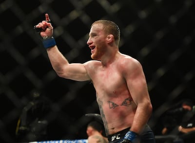 May 9, 2020; Jacksonville, Florida, USA; Justin Gaethje (blue gloves) celebrates after defeating Tony Ferguson (red gloves) during UFC 249 at VyStar Veterans Memorial Arena. Mandatory Credit: Jasen Vinlove-USA TODAY Sports