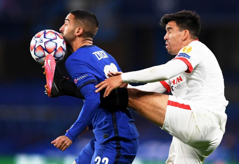 Chelsea's Hakim Ziyech is challenged by Marcos Acuna of Sevilla. Reuters