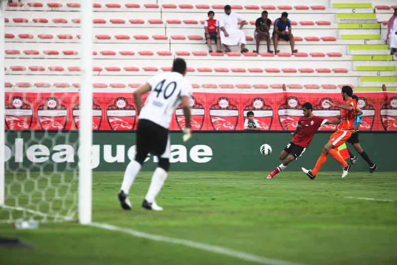Dubai, UAE, October 14, 2012:

Dubai and Ajman faced off tonight in the Etisalat Cup. Ajaman , in the end, was victorious, 2-1, after a very sloppy first half. 

A Dubai player sends a cross into the goal area. 

Lee Hoagland/The National