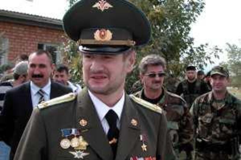 ** FILE ** In this Sept. 16, 2007 file photo, Sulim Yamadayev, center, seen at Hankala airport, a military base outside Grozny, Chechnya, southern Russia. Yamadayev  bitter foe of the Moscow-backed leader of Chechnya has been shot and badly wounded in Dubai, Russian news reports said Monday.  The newspaper Moskovsky Komsomolets said Sulim Yamadayev was attacked Saturday by an unidentified gunman near a luxury residential complex in Dubai where he lived. It quoted Yamadayev's brother as saying he was hospitalized with three gunshot wounds.(AP Photo) *** Local Caption ***  MOSB109_Russia_Dubai_Attack.jpg *** Local Caption ***  MOSB109_Russia_Dubai_Attack.jpg