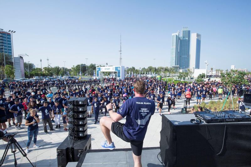 ABU DHABI, UNITED ARAB EMIRATES - Warming up before the event at the Terry Fox Run, Corniche Beach.  Leslie Pableo for The National