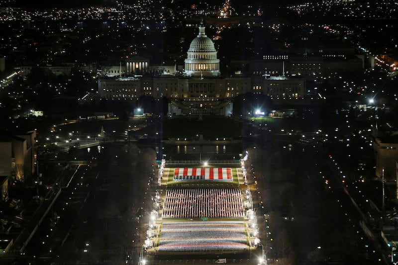 The 'Field of Flags' is illuminated on the National Mall. Reuters