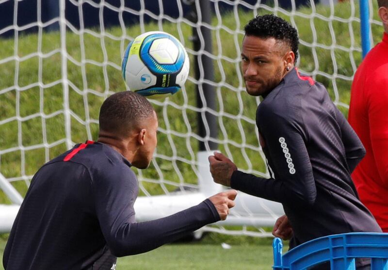 Paris St Germain's Neymar and Kylian Mbappe during training on August 10. Reuters