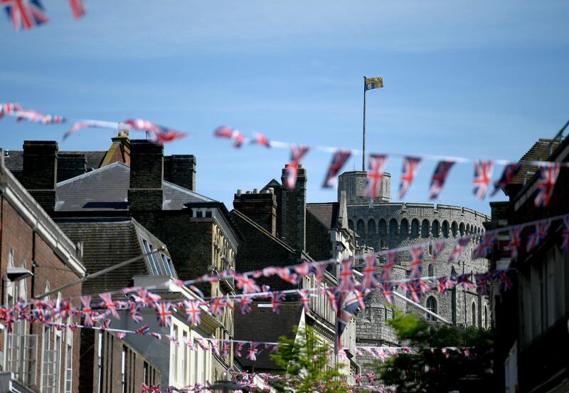 epa06736046 Bunting is displayed in Windsor, Britain, 14 May 2018. Britain's Prince Harry and his fiancee Meghan Markle will marry at Windsor Castle on 19 May.  EPA/NEIL HALL