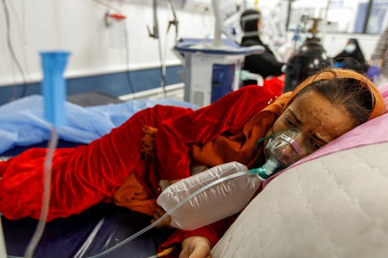 A girl who is infected with Covid-19 receives oxygen in a quarantine ward at a hospital in the holy city of Najaf, Iraq. Reuters