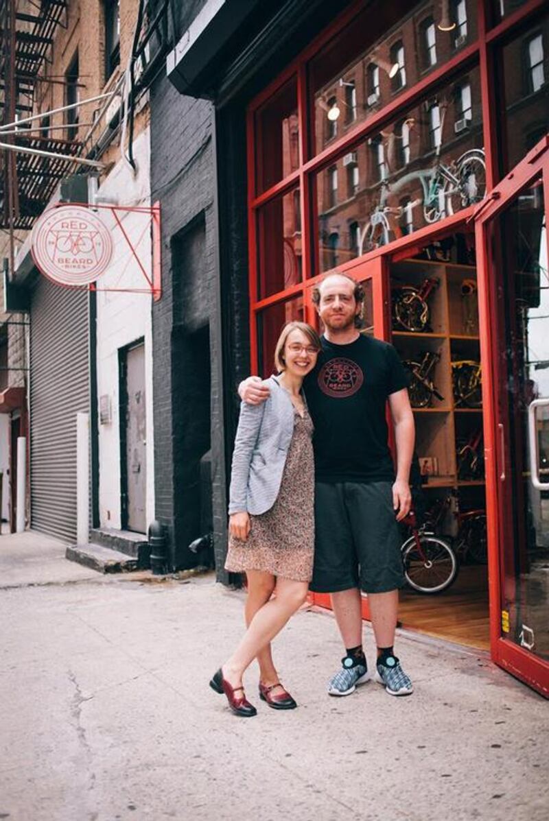 Kasia Nikhamina and her husband Ilya outside their shop Red Beard Bikes in Brooklyn, New York. Image courtesy Sam Polcer