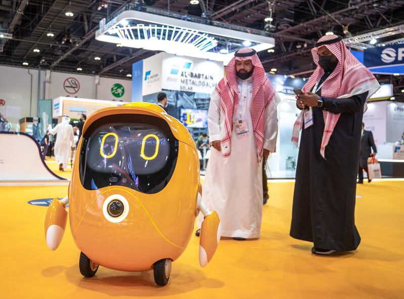 The Opti Robot, official mascot of Expo 2020 Dubai, visits the Future Energy Summit Abu Dhabi National Exhibition Centre, on Jan 19. Victor Besa / The National