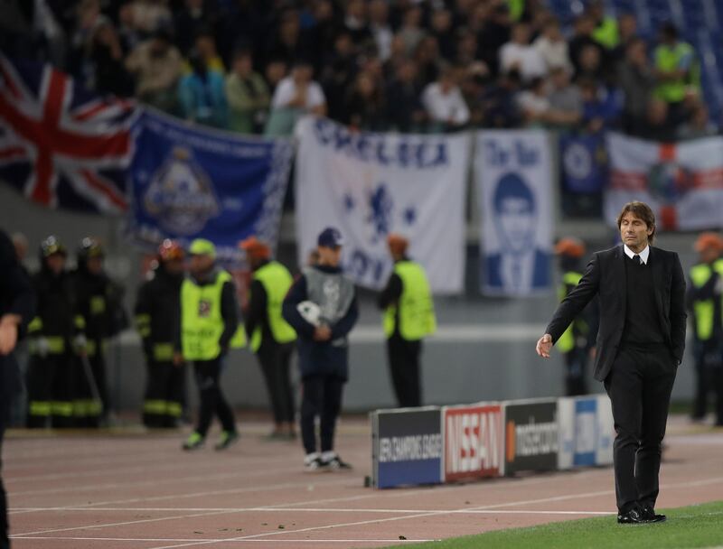 Chelsea coach Antonio Conte stands, during the Champions League group C soccer match between Roma and Chelsea, at the Olympic stadium in Rome, Tuesday, Oct. 31, 2017. (AP Photo/Alessandra Tarantino)