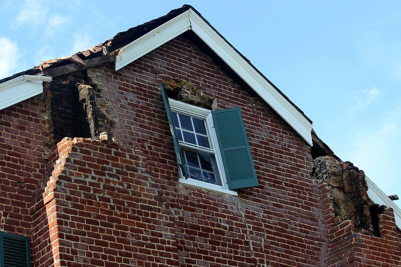CUCKOO, VA - AUGUST 23: An historic home belonging to Jane and Percy Wootton is shown damaged by the early afternoon 5.8 earthquake whose epicenter was located nearby August 23, 2011 in Cockoo, Virginia. The quake resulted in scattered damage and frayed nerves for residents, but no reported injuries.   Tom Whitmore/Getty Images)   Tom Whitmore/Getty Images/AFP== FOR NEWSPAPERS, INTERNET, TELCOS & TELEVISION USE ONLY ==
 *** Local Caption ***  667482-01-09.jpg
