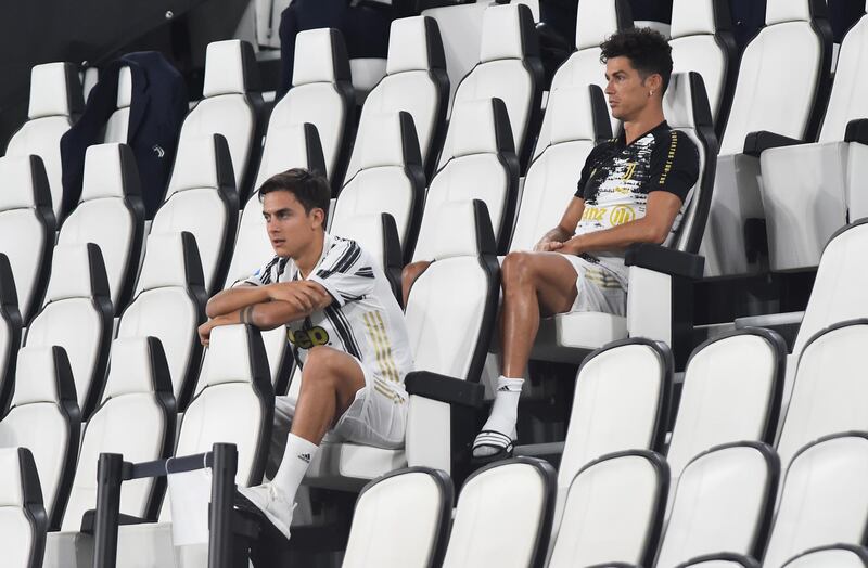 Juventus' Cristiano Ronaldo and Paulo Dybala in the stands during the 3-1 defeat to Roma. Reuters