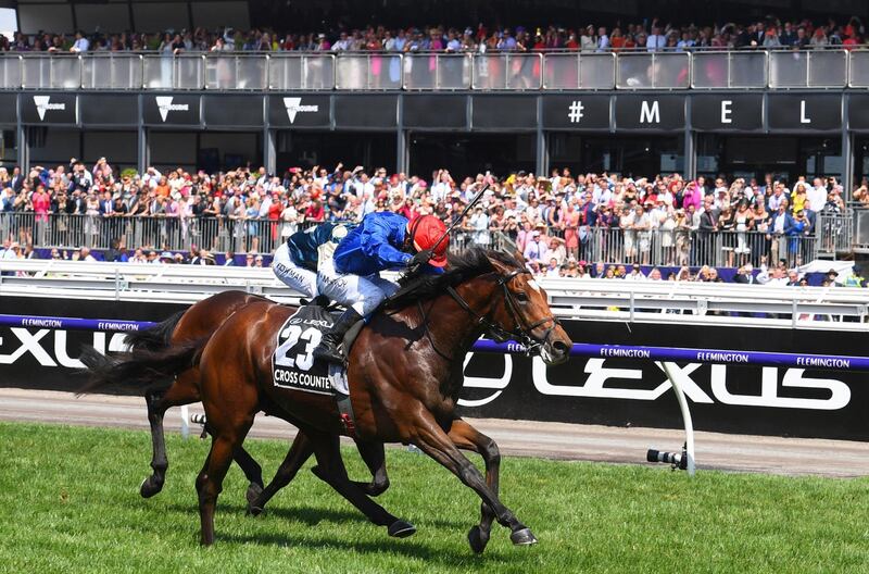 Kerrin McEvoy riding Cross Counter defeats Hugh Bowman riding Marmelo in Race 7 to win the Melbourne Cup race. Getty Images