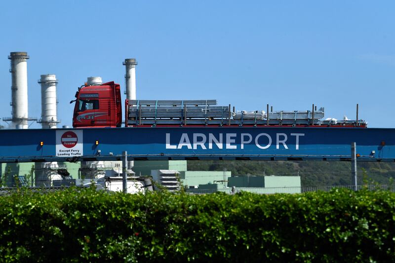 A lorry crosses a ramp to deliver goods to a ferry bound for Scotland from Larne, Northern Ireland. Reuters