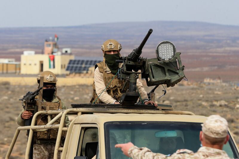 Jordanian soldiers patrol near the eastern Jordan-Syria border, in Mafraq governorate.  AP Photo