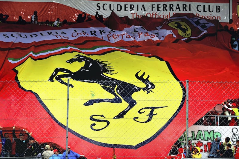 MONZA, ITALY - SEPTEMBER 02: The Tifosi wave a Ferrari banner during qualifying for the Formula One Grand Prix of Italy at Autodromo di Monza on September 2, 2017 in Monza, Italy.  (Photo by Mark Thompson/Getty Images)