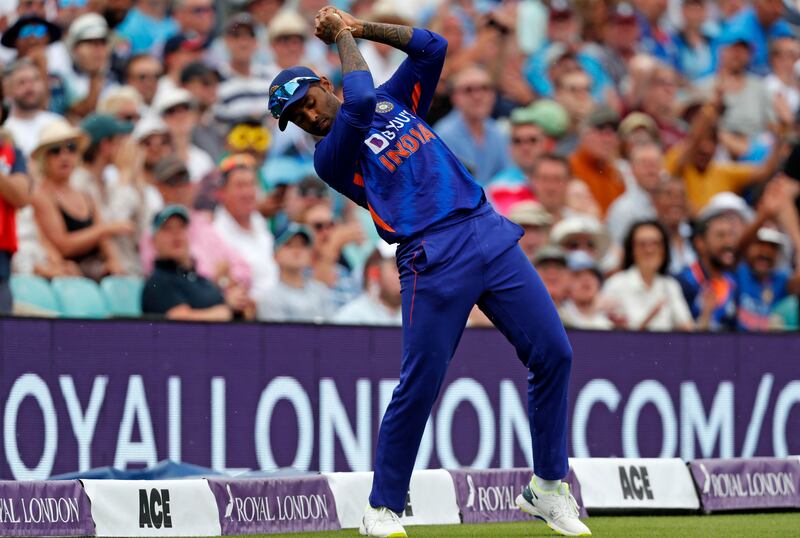 India's Suryakumar Yadav catches the ball to claim the wicket England captain Jos Buttler. AFP