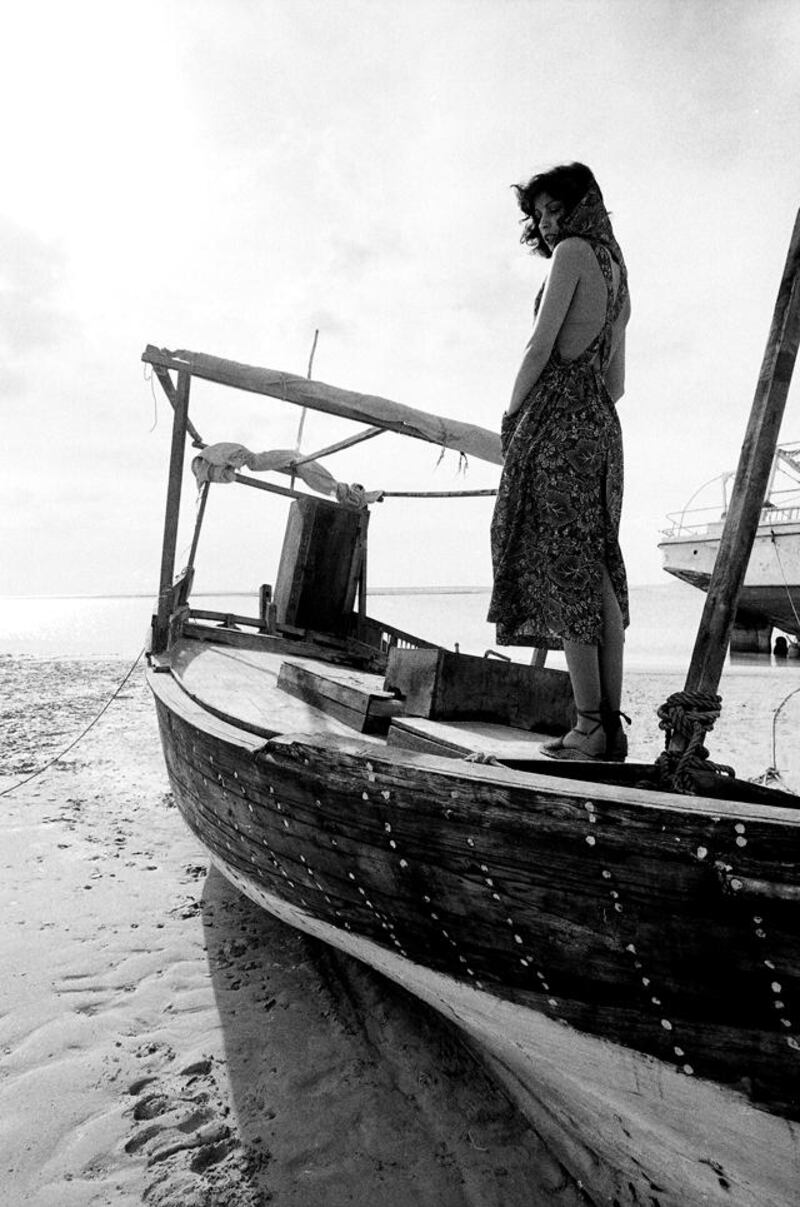 Abu Dhabi, UAE 1974. History Project 3 / 2012. Fashion shoot featuring a model named Kathy wearing clothes by the French Label Cacharel. Shot by French photographer Jack Burlot on location in Abu Dhabi 1974 - featuring The Al Hosn Fort, a dhow, Land Rover and local men. 

Eds Note * Permission needed before use. Karen* 
JACK BURLOT <corporate.images@wanadoo.fr>

