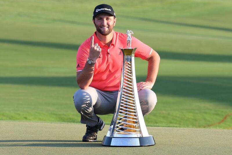 DUBAI, UNITED ARAB EMIRATES - NOVEMBER 24: Jon Rahm of Spain poses with the Race to Dubai trophy following his victory during Day Four of the DP World Tour Championship Dubai at Jumerirah Golf Estates on November 24, 2019 in Dubai, United Arab Emirates. (Photo by Ross Kinnaird/Getty Images)